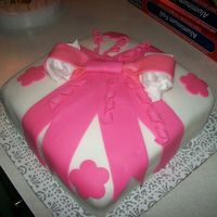 Wilton Course 3 Had fun with this cake foundant is pretty easy to work with. hard a hard time with the bow