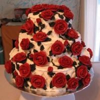 Red Climbing Roses Tiered Cake All the decorations are buttercream. I used a spaced basketweave pattern to make a trellis on the side of each cake and made the vines look...