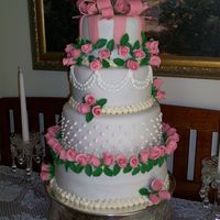 Rose Buds It is an Almond cake with Chocolate BCC frosting and homemade Almond fondant. My husband and I made this cake for our oldest daughter'...