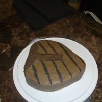 Steak With Grill Marks okay...this didn't come out nearly as good as I wanted...It is german chocolate cake, with german chocolate filling, and chocolate...