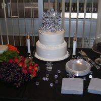 Bridal Shower Cake 2 tier white cake with buttercream. Handmade snowflake cake topper.