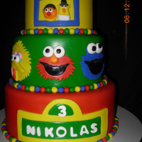 Sesame Street Cake I made this for my 3 year old's birthday. He loved it! All fondant, my 1st time trying to make faces =} Harder that I thought! But I...