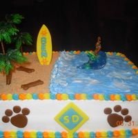 Scooby Doo Surfing Cake Scooby Doo Cake, all buttercream except for the fondant surf board, sc logo, and bones.