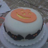 Course 4 - Fondant This was my first stab at fondant. Covered in fondant, designs in fondant as well.