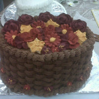 Course 2 - Basketweave Made this for my course 2 finale cake. Cake is frosted in buttercream, basket weaved. Flowers are made from royal icing.