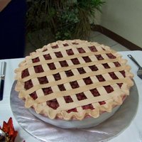 Kamphaus Grooms Cake Chocolate cake, with whipped chocolate ganache and covered in fondant. This was an 18" cake that fed about 120.