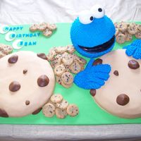 Cookie Monster Cookie Monster cake for our nephew's 2nd birthday. The big "cookies" are cake and the Cookie Monster head is Rice Krispie...
