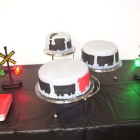 Train Silhouette Birthday Cake Cake made for an 80th birthday party for a man who retired from the railroad. Got the idea on the forum - thanks to ladywax05.