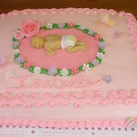 Baby Shower Cake Pink Baby Shower Cake with a fondant baby and butterflies. The left back corner was knocked off at the last minute and I had to repair it....
