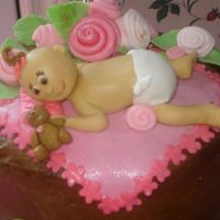 Baby Baby made for baby shower cake. It's my first baby. Teddy Bear is also made with fondant. I loved this one.