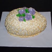 Easter09_024.jpg CSM. Snickerdoodle cake with cinnamon BC. I painted the cornelli lace and the tips of the roses with gold luster dust to give it more of a...