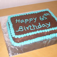Simple Birthday Cake Just a simple chocolate cake with buttercream frosting which i made for my mother in law's bday..my second frosted cake..