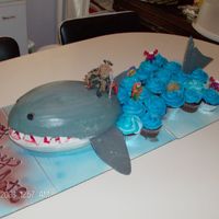 Shark Cake Wanted a shark cake, so I gave him one. It is supposed to resemble a shark coming up out of the water. all buttercream except for eyes and...