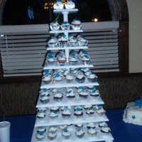 Birthday Cake Tower 160 Cupcakes on Tower with matching silver and blue fondant stars..Matching cake also