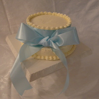 Blue Bow i made this for my friend's bridal shower, it is an almond cake with swiss buttercream. she wanted something simple but elegant.