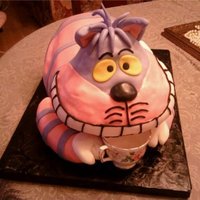 Chesire Cat Sculpted cake, not the best photo....