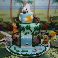 1St Birthday Cake (Jungle Theme) This is the cake I made for my daughter's 1st birthday. I searched the web and found a bunch of cakes that I borrowed ideas from. Each...