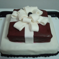 Pops Cake Pops 2 tier cake. Yellow cake. Made with Fondant.