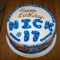 Nick's Football Birthday 10" rounds stacked, all b/c; footballs surround the sides with football words (block, punt, etc)