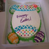 Happy Easter! all b/c; large oval pan with smaller egg cakes on the side.