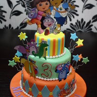 Twins Dora, Diego & Friends Birthday 4", 6" and 8" Rounds. Chocolate Fudge Cake with Belgian Chocolate Buttercream and Lemon Cake with Mango Buttercream. Most...