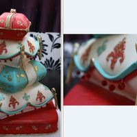 Pillow Wedding Cake Red, Teal, Ivory and Gold - colours matched to clients wedding invitation. Wedding White Cake with Mango Buttercream. Gumpaste Tassels and...