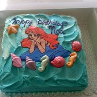 Noa's Ariel Cake White Cake with mounds of Buttercream, gumpaste shells