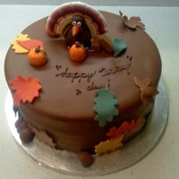 Happy Turkey Day All Chocolate Cake with chocolate fudge frosting. Covered in & decorated with fondant.
