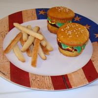 Hamburger And French Fries This is a hamburger cupcake with sugar cookie french fries. I got the idea from bakerella.com. Thank you for the wonder tutorial. Everybody...