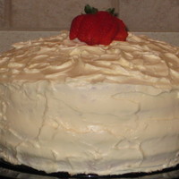 Strawberry Tall Cake White cake with 4 layers of Cream Cheese Frosting, Strawberry Glaze and Fresh Strawberries
