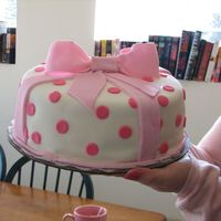 First Time Fondant This cake is covered with white fondant and a pink fondant bow with polka dots. It was so much fun to make! Like playing with playdough!!