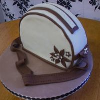 Auntie Joyce's Birthday Cake I made this from an 8" round HD Sponge (with a little trimed from one end) it is Fondant covered with fondant accents. I was inspired...