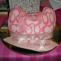 Hot Pink Coach Bag This was my first coach bag cake. I made this for my niece's 15th birthday.I made the cake out of pink fondant and cut the "C&#...