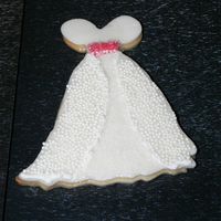 Bride's Dress NFSC brides dress. Fondant with royal icing, sugar cyrstals and white sprinkles. Made for a friend's bridal shower.