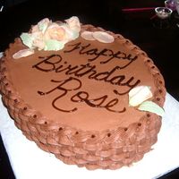 Roses For Rose Golden butter cake (seems to be the fav) with chocolate buttercream and filling, with basketweave piping along the sides and peach gumpaste...