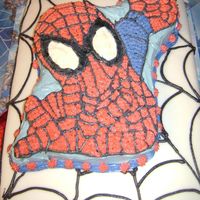 Spiderman my son's 5th birthday cake. 2 layer buttercream spiderman and fondant spider web.