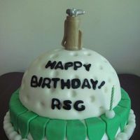 Golf Ball! a golf ball accessorized with a wax golf bag and a golf-themed candle!