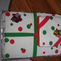 Elonchristmascake.jpg Hubby told me the DAY BEFORE that he volunteered me to make a christmas cake for where he works.................and he wanted A LOT of cake...