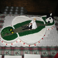 Get Off Your Tractor And Take Me To The Chapel! This cake was done for my Aunt and Uncle's wedding. My uncle loves John Deere! My proprtions are not exactly right, but they like it...