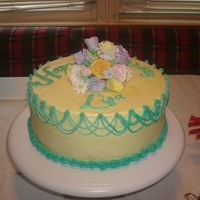 Lisa's 17Th Bday First time doing gumpaste flowers and drop strings....not perfect, but she loved it anyway. WASC with Dulce de Leche filling with swiss...