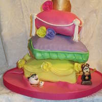 Princess Pillows My daughter saw a similar cake by Andrea's Sweet Cakes and made some requests! She wanted Aurora, Belle, and Ariel pillows, as well as...