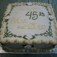 Ivory And Sage Anniversary Cake Had a lot of fun with this one. A regular customer called and wanted "whatever you think would work". I believe it was a ten inch...