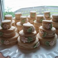 Wedding Cake Cookies Been wanting to make these for such a long time! Held together with white chocolate. Royal icing flowers.