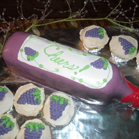 Wine Bottle Cake With Cupcakes 