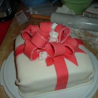 Present Box Cake this was my first cake using fondant. It came out okay, i made about 4 years ago...I prefer to not use the stuff, but some people like it...