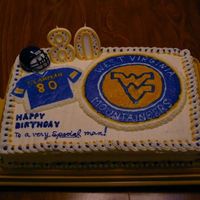 Mountaineer Fan 80Th Birthday Frosting & borders with almond flavored buttercream frosting. FBCT for emblem & football jersey using same frosting. This was a...