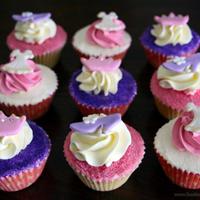 Princess Cupcakes Princess Cupcakes - Vanilla cupcakes covered with a thin layer of buttercream icing, dipped into sugar crystals and then topped with an...