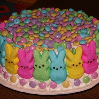 Easter Cake Made this cake from a CC recipe - Orange creamsicle. Side of cake is peeps and top is M&Ms. Had to hide chocolate candies under the...