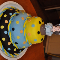 Baby Shower Cake This theme was matching the decorations. Top two layers are strawberry with strawberry filling, bottom layer is chocolate. Topper is made...