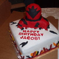 Power Rangers Red Power Ranger coming out of cake was rkt covered in fondant